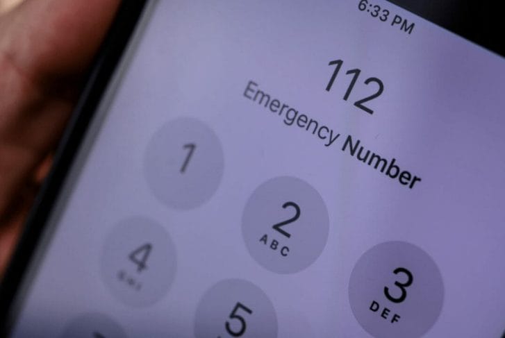 Mobile phone screen showing 112 Emergency Number