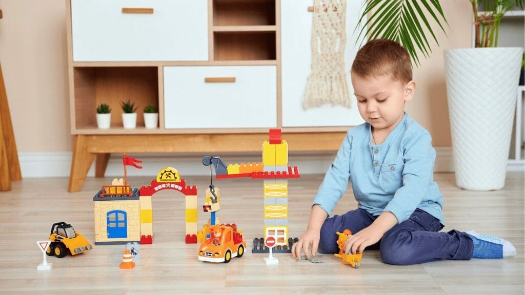 Boy playing with kids toys