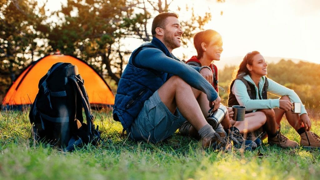 three people on a camping trip