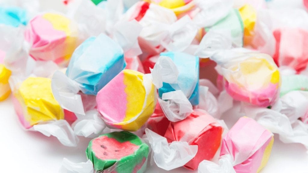 Colourful candies on a white table